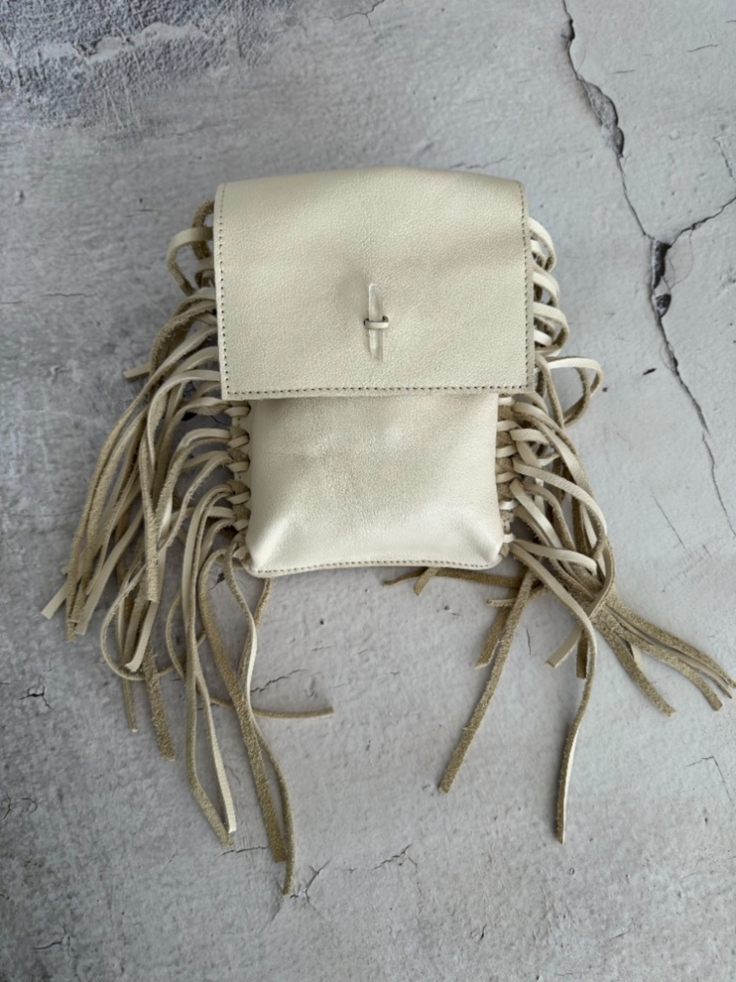 Orion Mini bolsa de Cuero con flecos